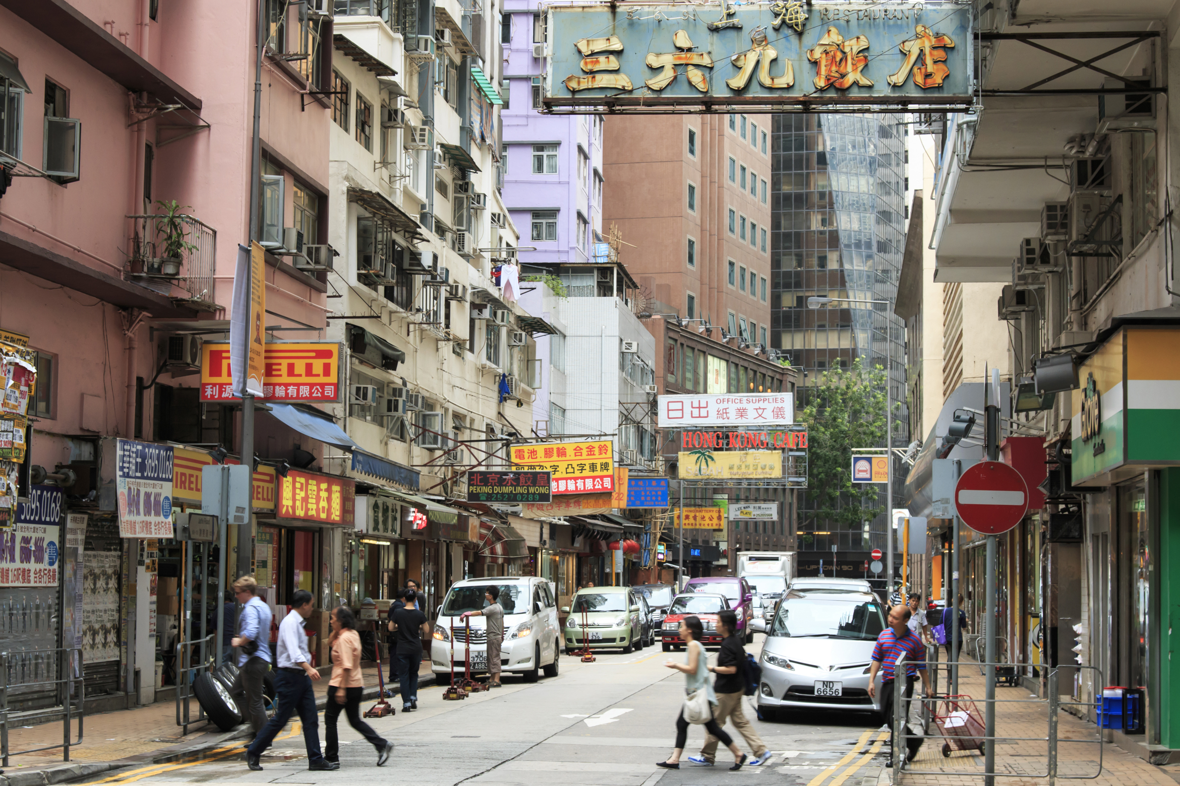 people-walking-street-amidst-buildings